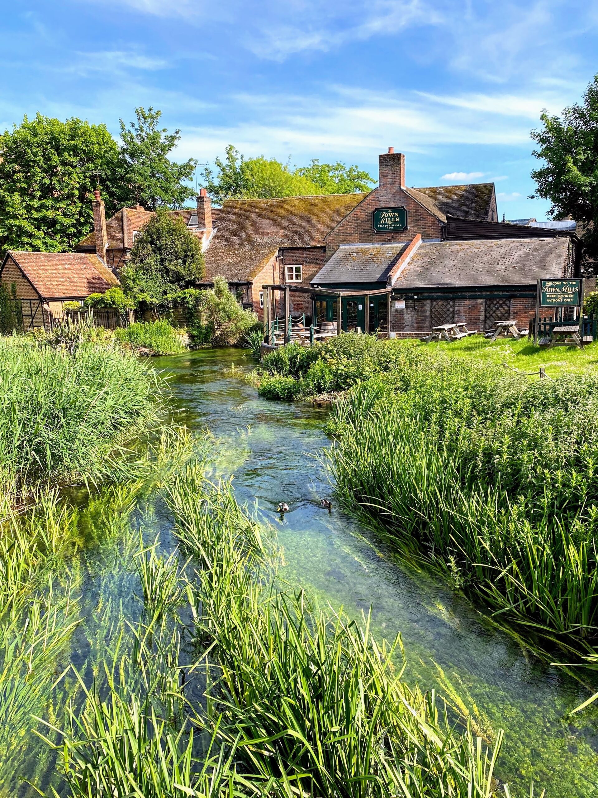 A local pub in Andover that sits infront of a stream of water.