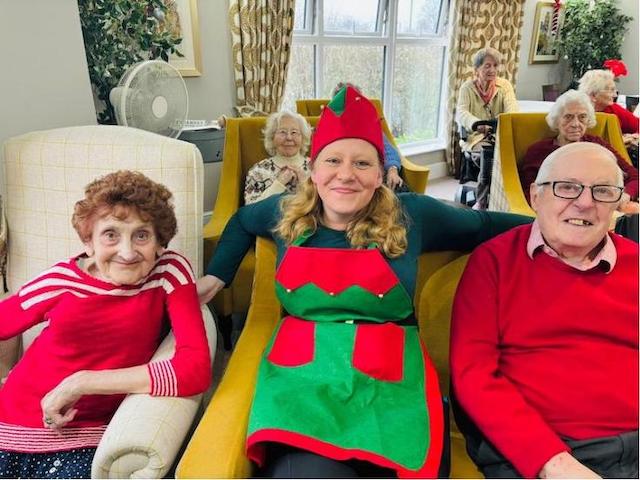 Residents with a staff elf