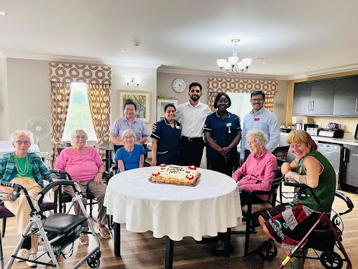 a group photo of our team members and residents