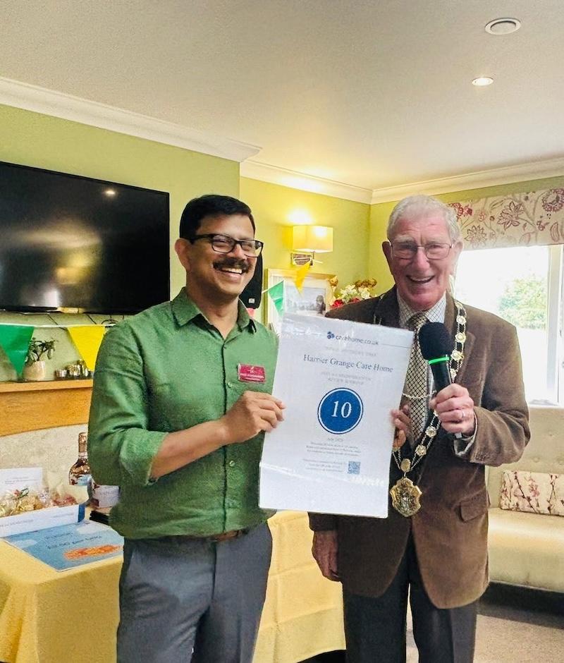 our home manager with the mayor