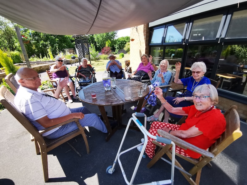 group of residents sat around the table together