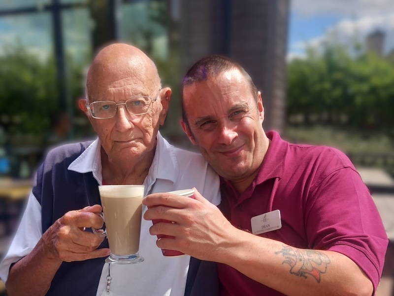 one of our residents enjoying a drink at costa