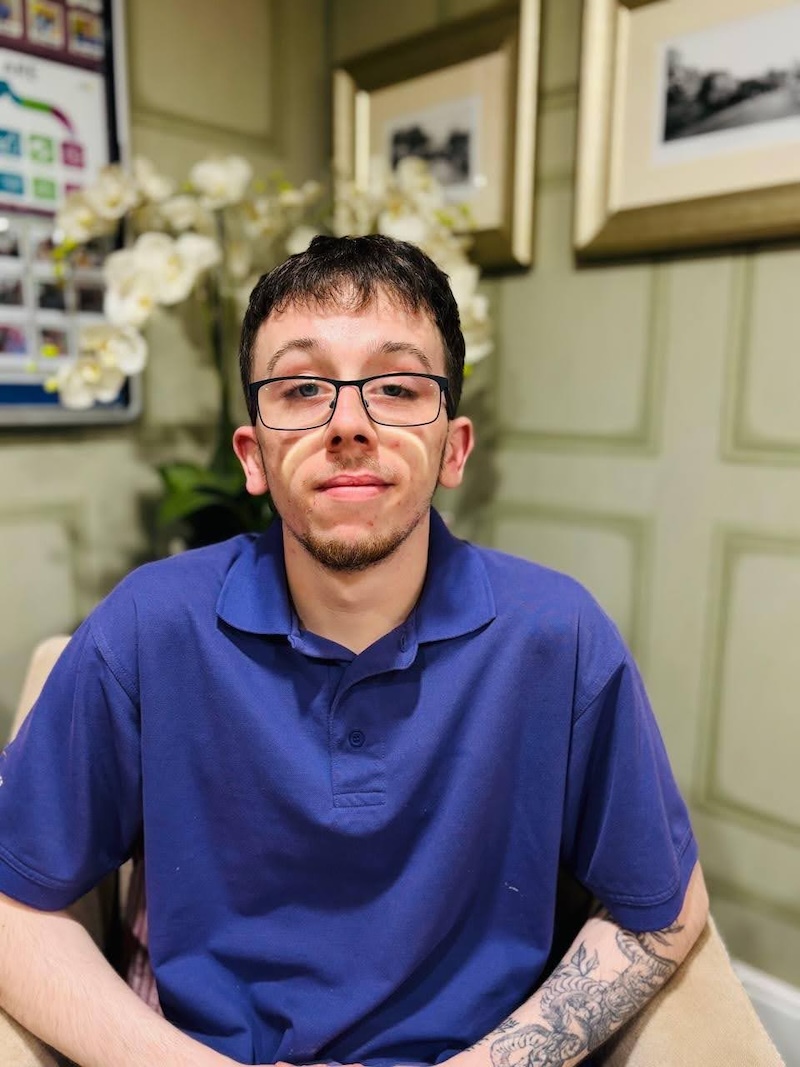 Kian our kitchen assistant having his headshot taken for the team page