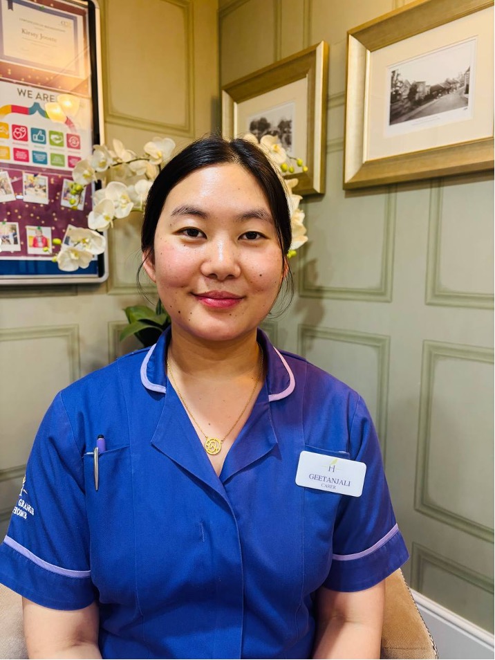 lady looking at camera posing for staff picture