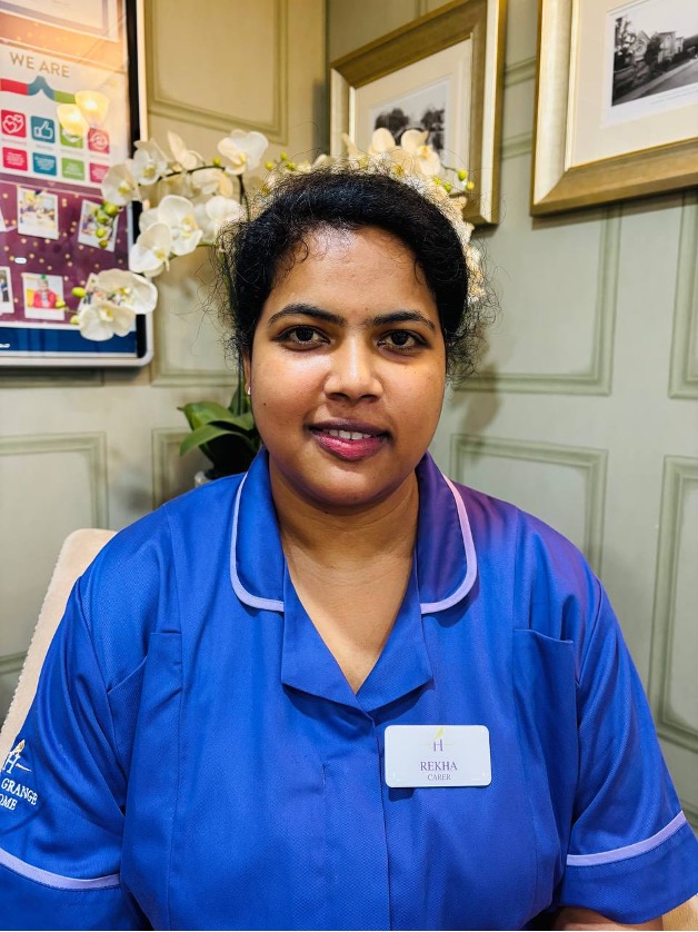 lady looking at camera posing for staff picture
