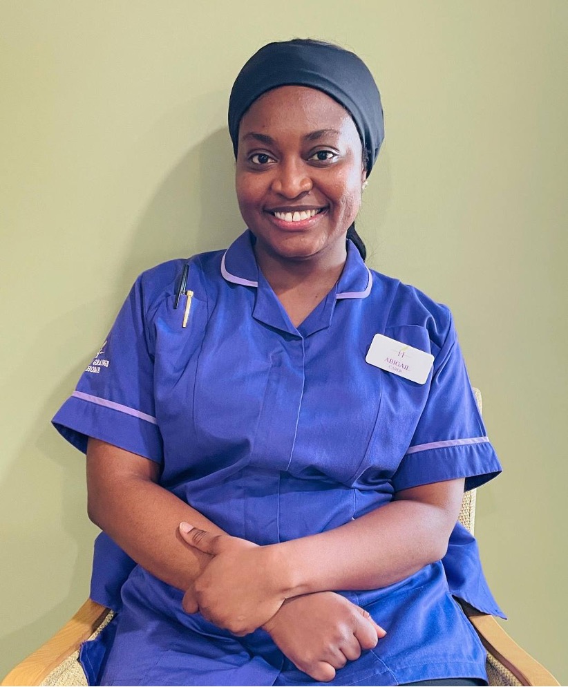 lady looking at camera posing for staff picture