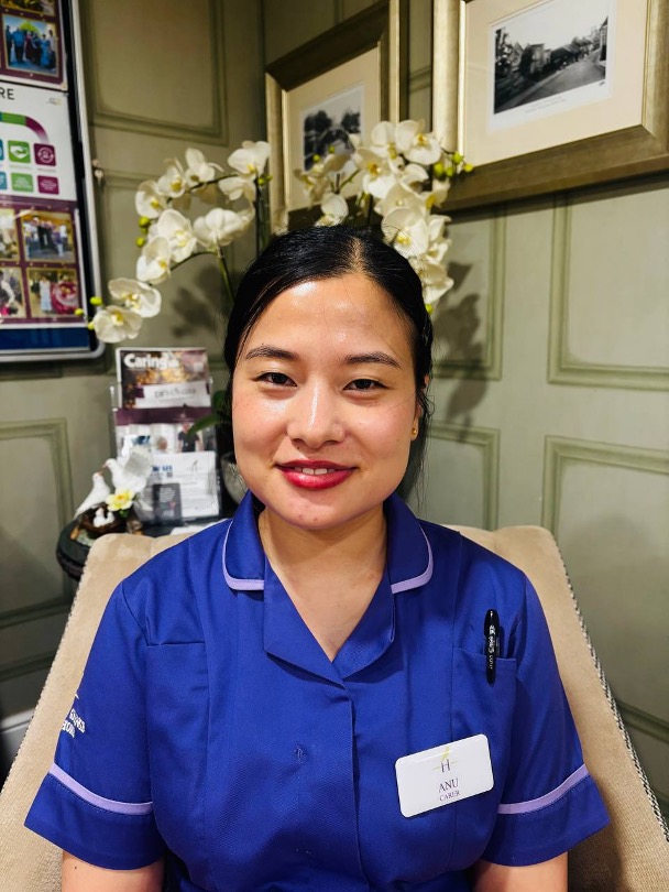 lady looking at camera posing for staff picture