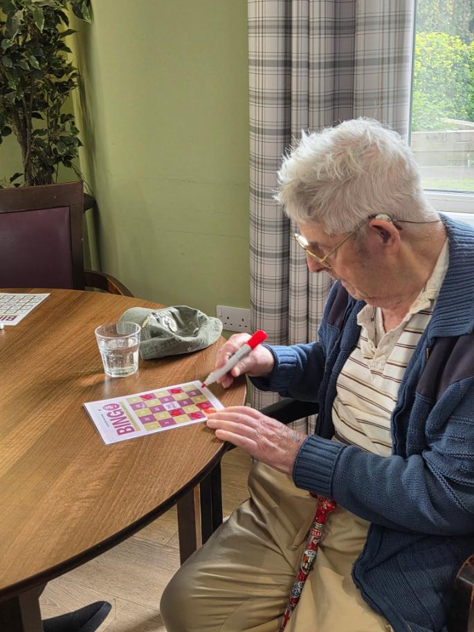 older man playing bingo