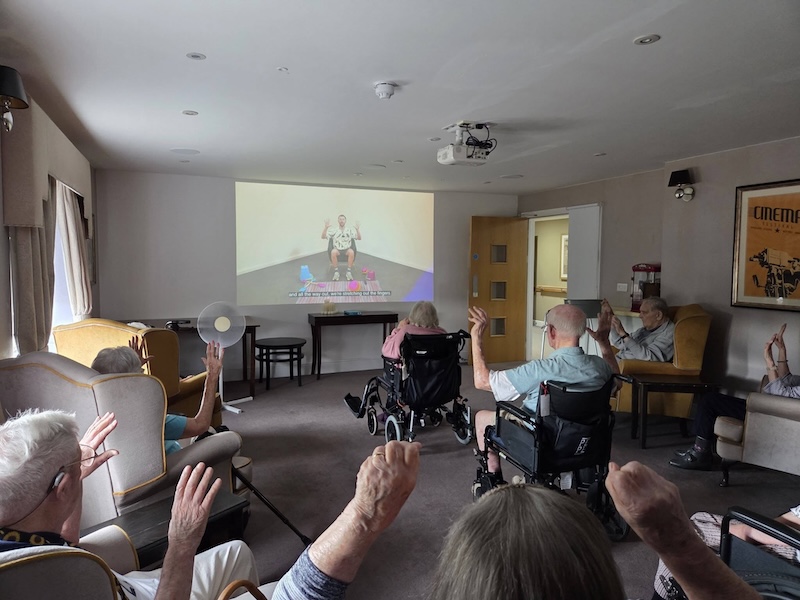 residents watching exercise video